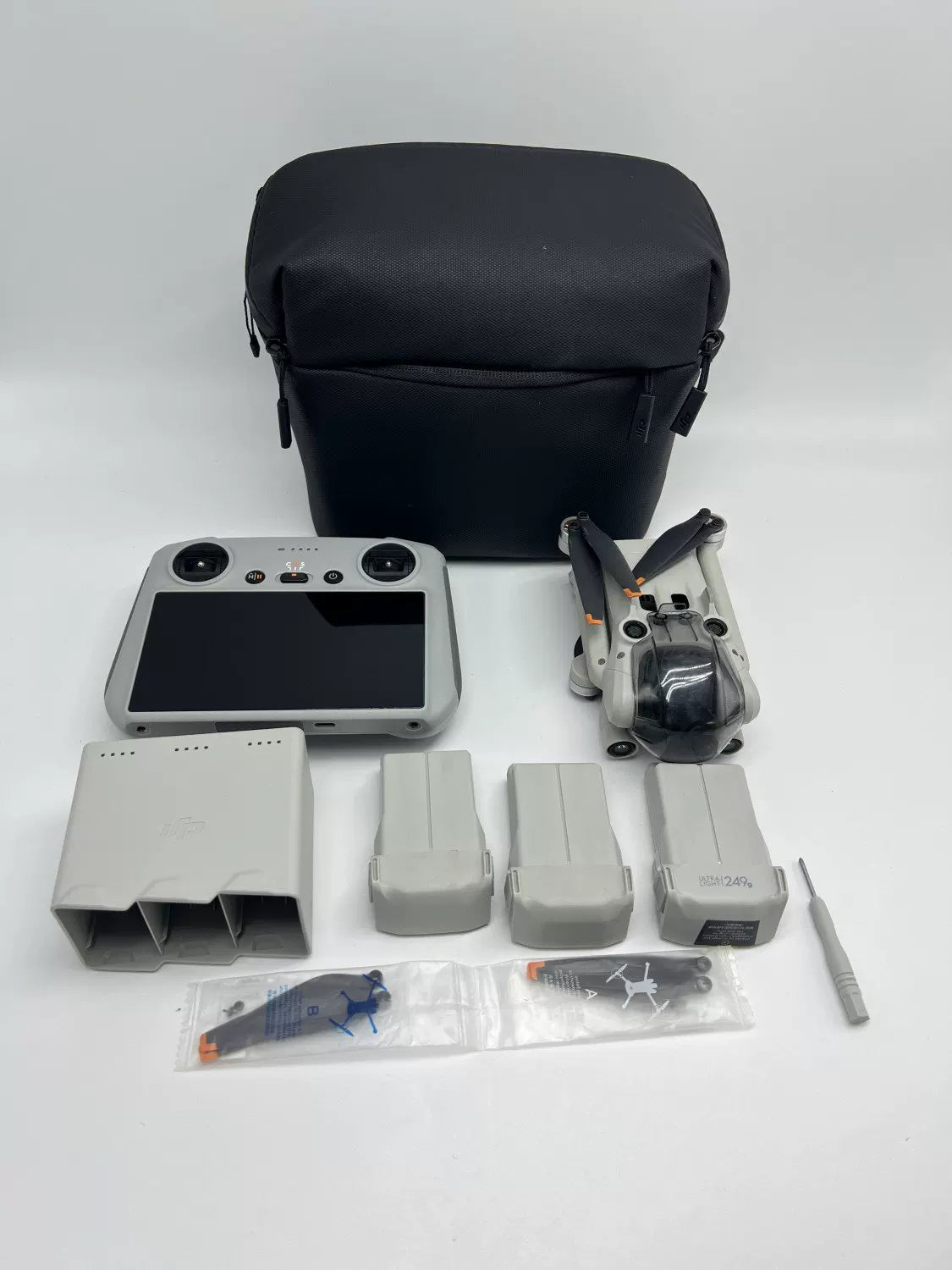 DJI Mini3pro with Screen, Extended Battery Fly More Combo with DJI Care Refresh