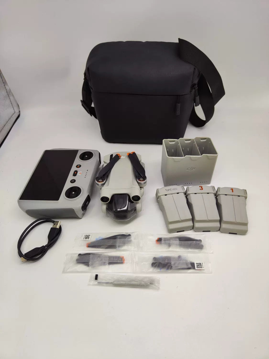 DJI Mini3pro with Screen, Extended Battery Fly More Combo with DJI Care Refresh