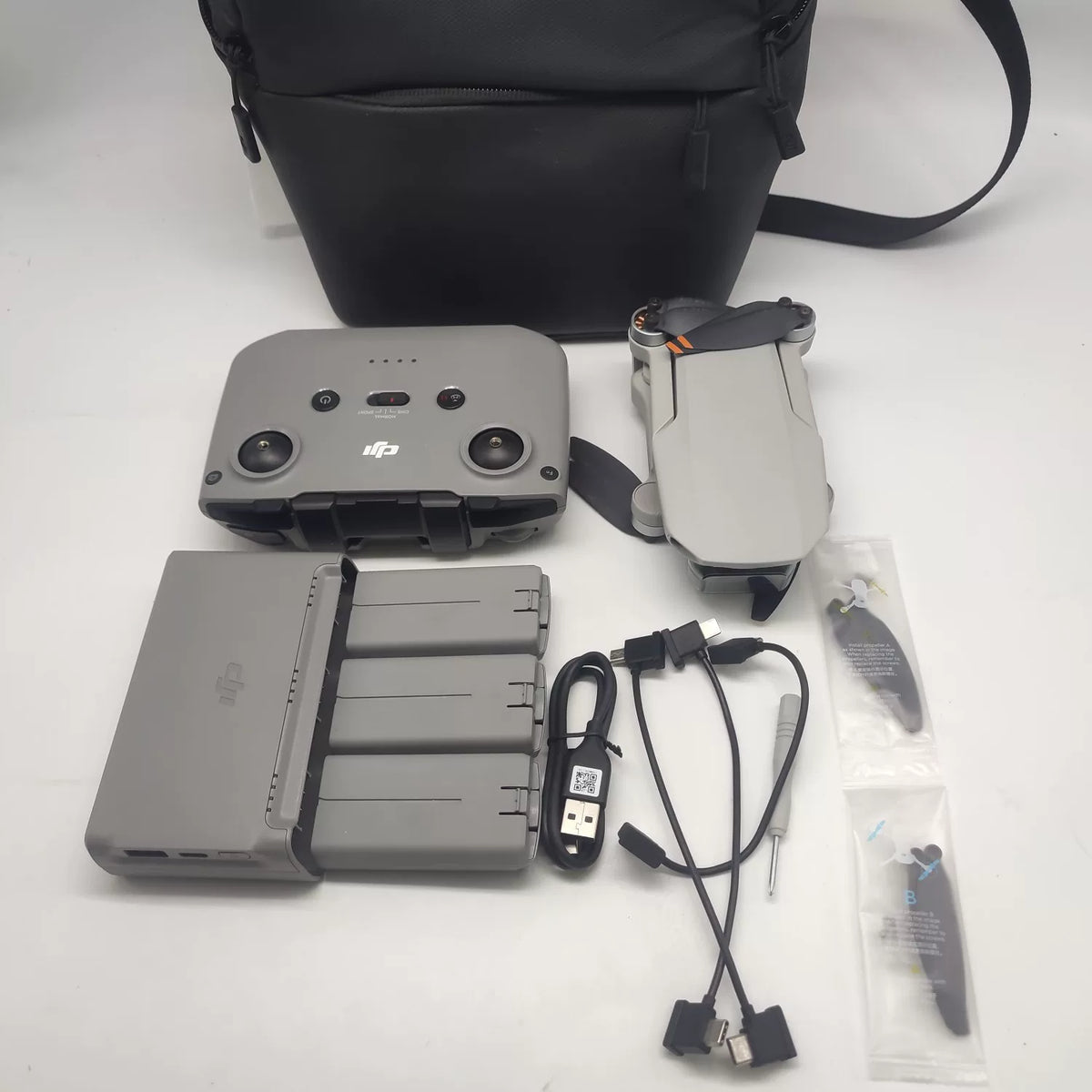 95% New (Like New) DJI Mini 4K Fly More Combo with 2-Year Edition DJI Care Refresh