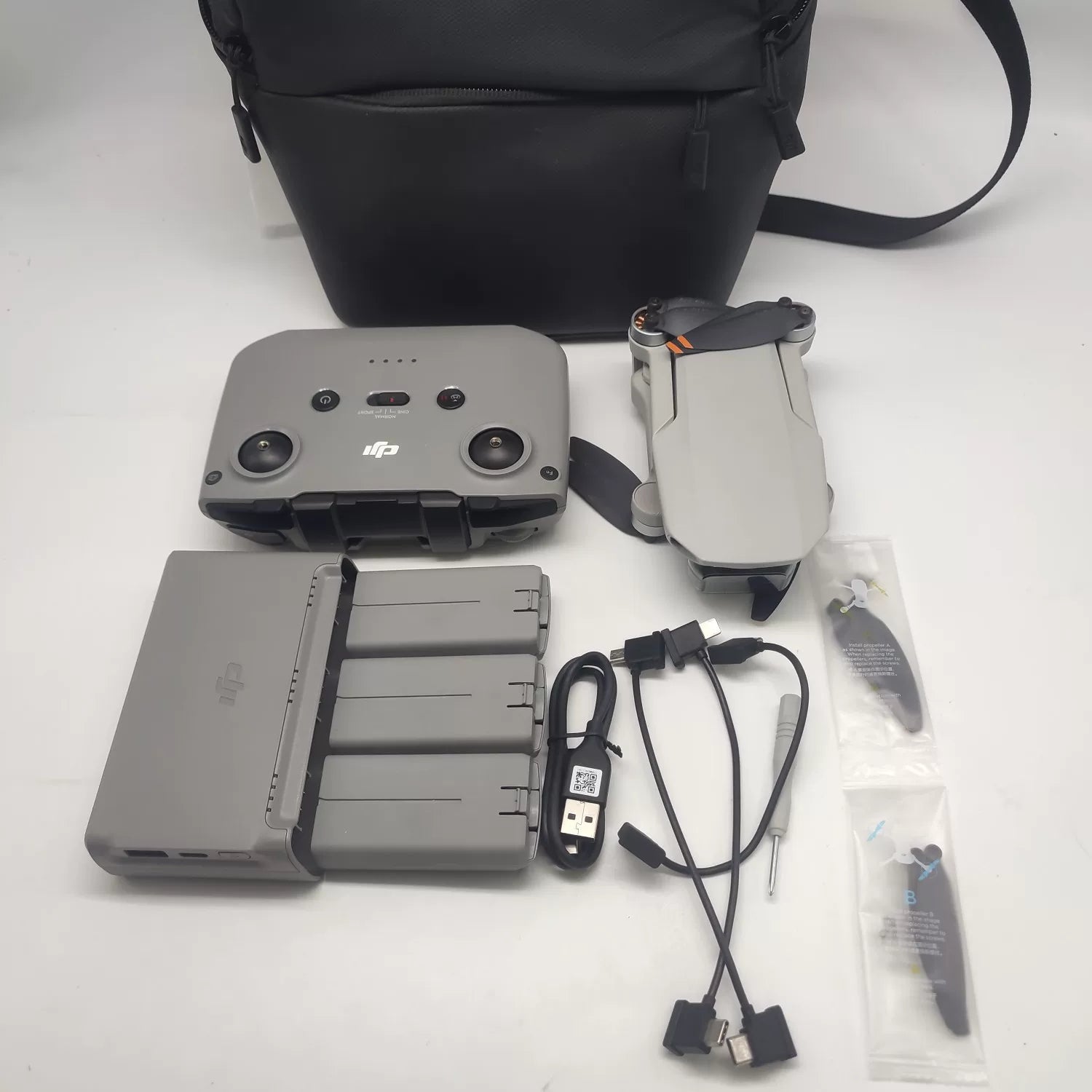 95% New (Like New) DJI Mini 4K Fly More Combo with 2-Year Edition DJI Care Refresh