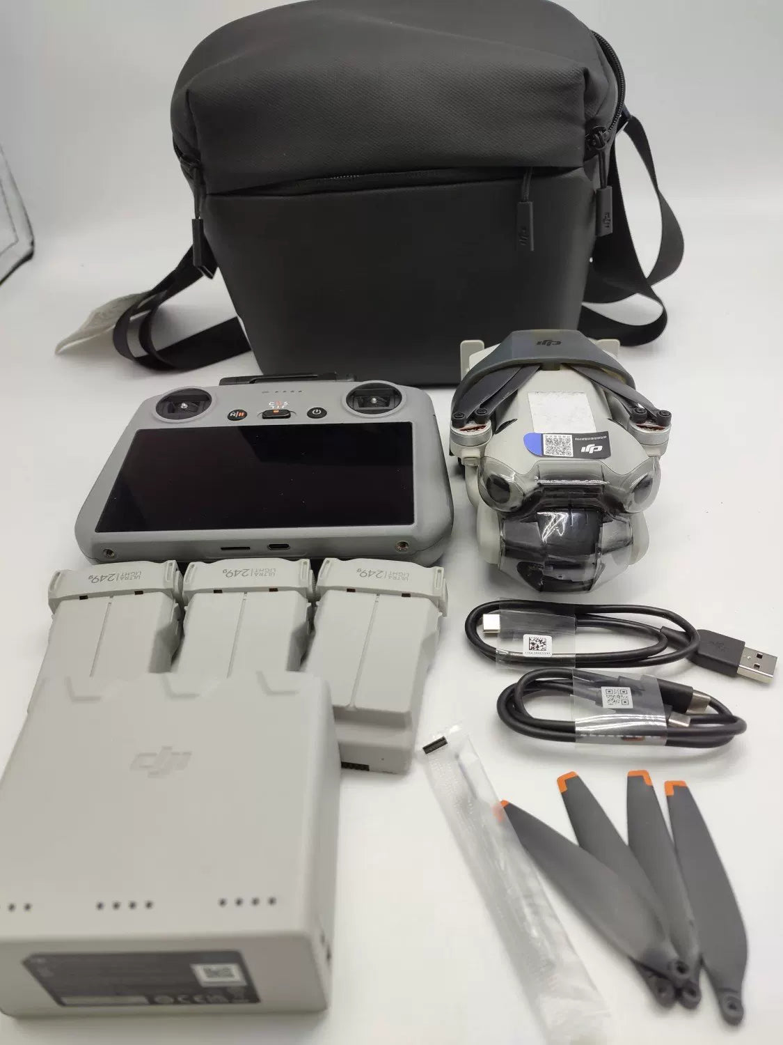 99% New (Mint) DJI Mini 4 Pro with Screen Fly More Combo with DJI Care Refresh