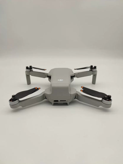 99% New (Mint) DJI Mini 2 SE Fly More Combo with DJI Care Refresh