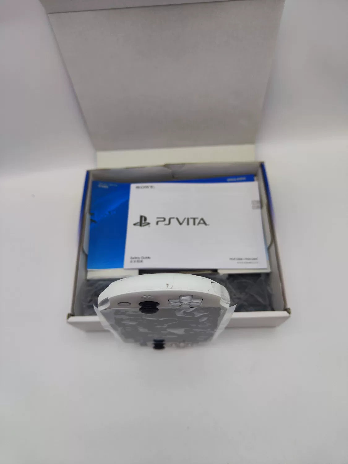 95% New (Like New) Sony PSV2000 Glacier White