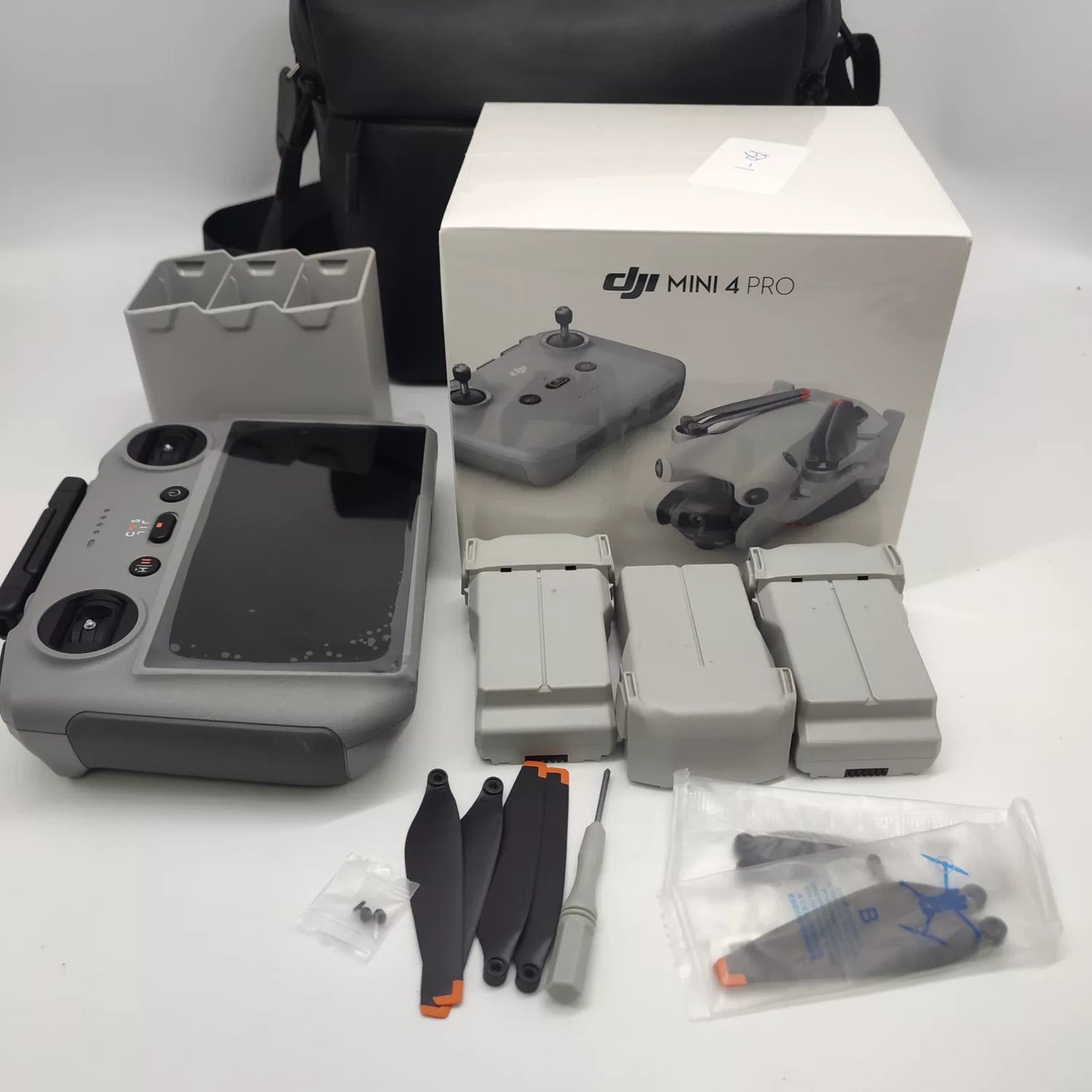 Brand New (Body Sealed) Mini 4 Pro with Screen, Extended Battery Fly More Combo with DJI Care Refresh