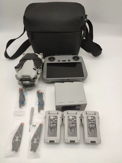 99% New (Mint) DJI Mini 4 Pro with Screen, Extended Battery Fly More Combo with DJI Care Refresh