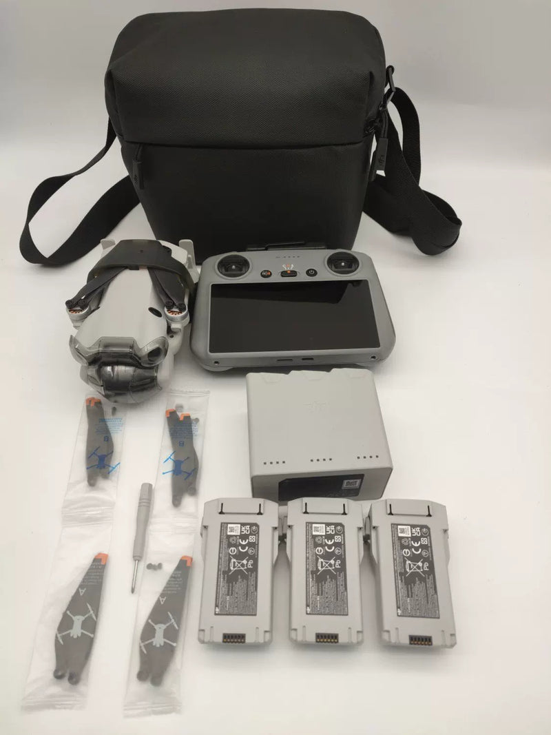 99% New (Mint) DJI Mini 4 Pro with Screen, Extended Battery Fly More Combo with DJI Care Refresh