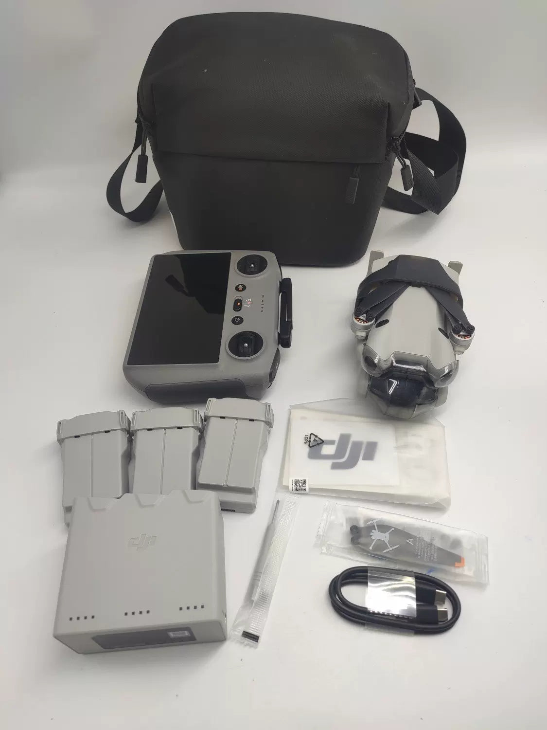 DJI Mini 4pro with Screen, Extended Battery Combo with DJI Care Refresh