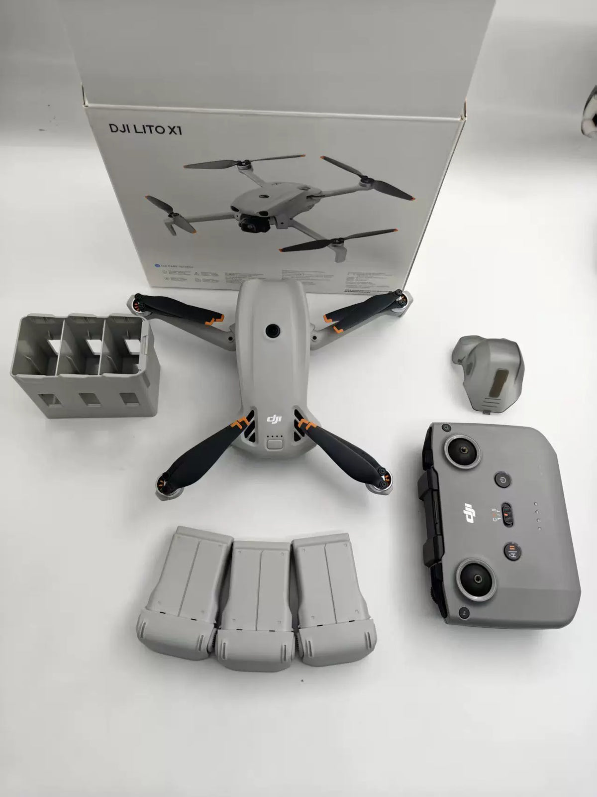 99% New (Mint) DJI Lito X1 Standard Remote Fly More Combo Plus – photo 1