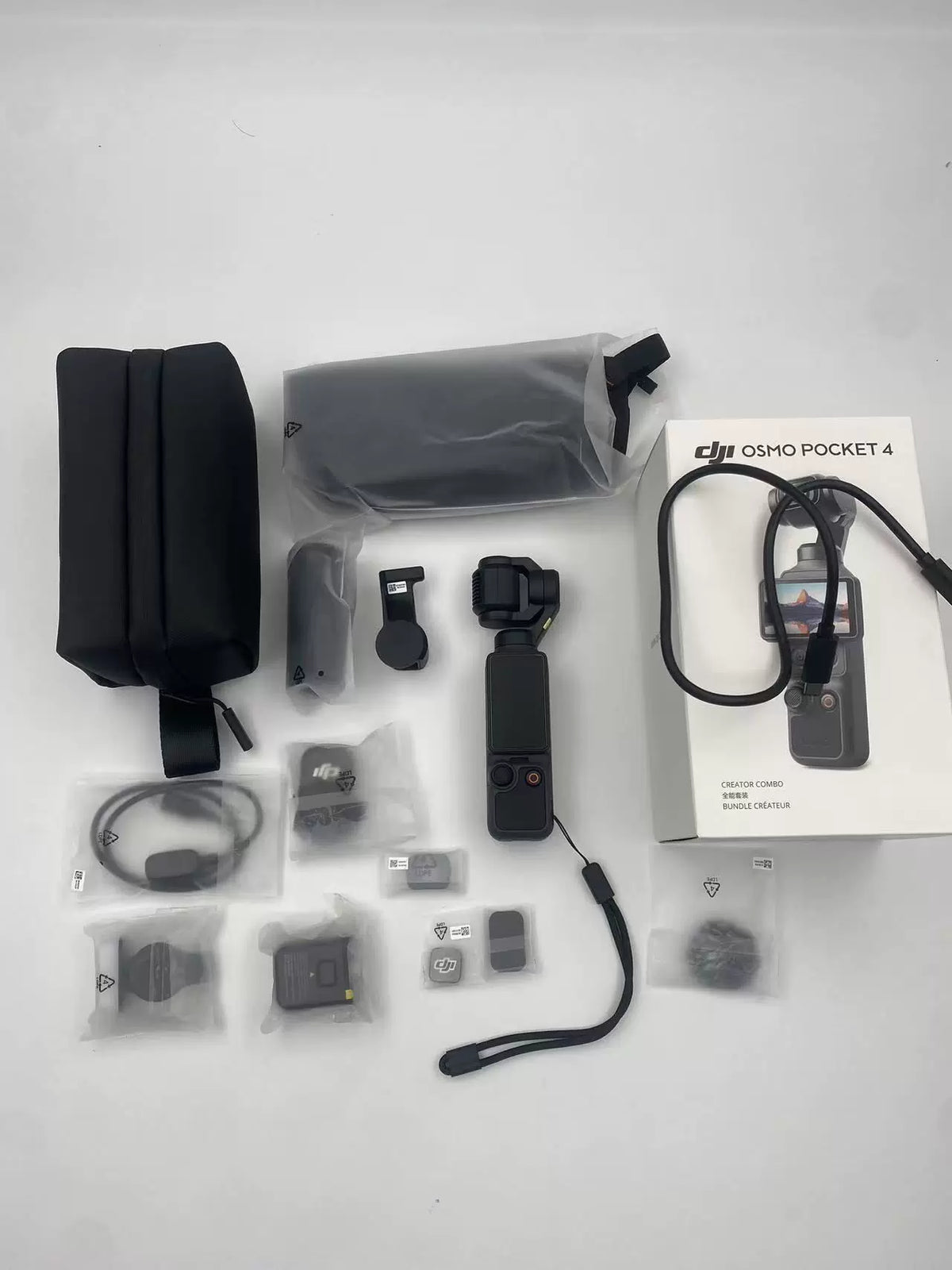 99% New (Mint) DJI Osmo Pocket 4 Creator Combo – photo 1