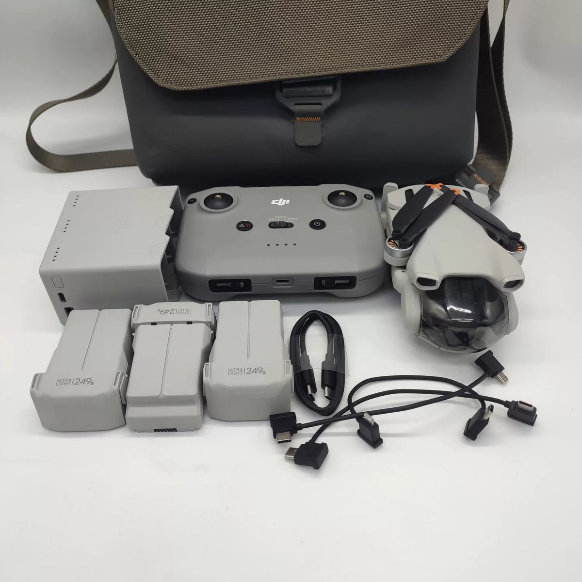 95% New (Like New) DJIMini3 Fly More Combo with DJI Care Refresh