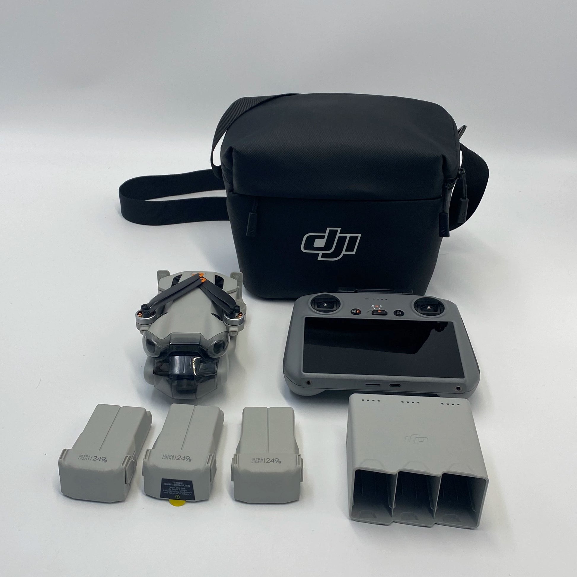 DJI Mini 4 Pro with Screen Remote Fly More Combo and Care Refresh - Excellent (95% New)