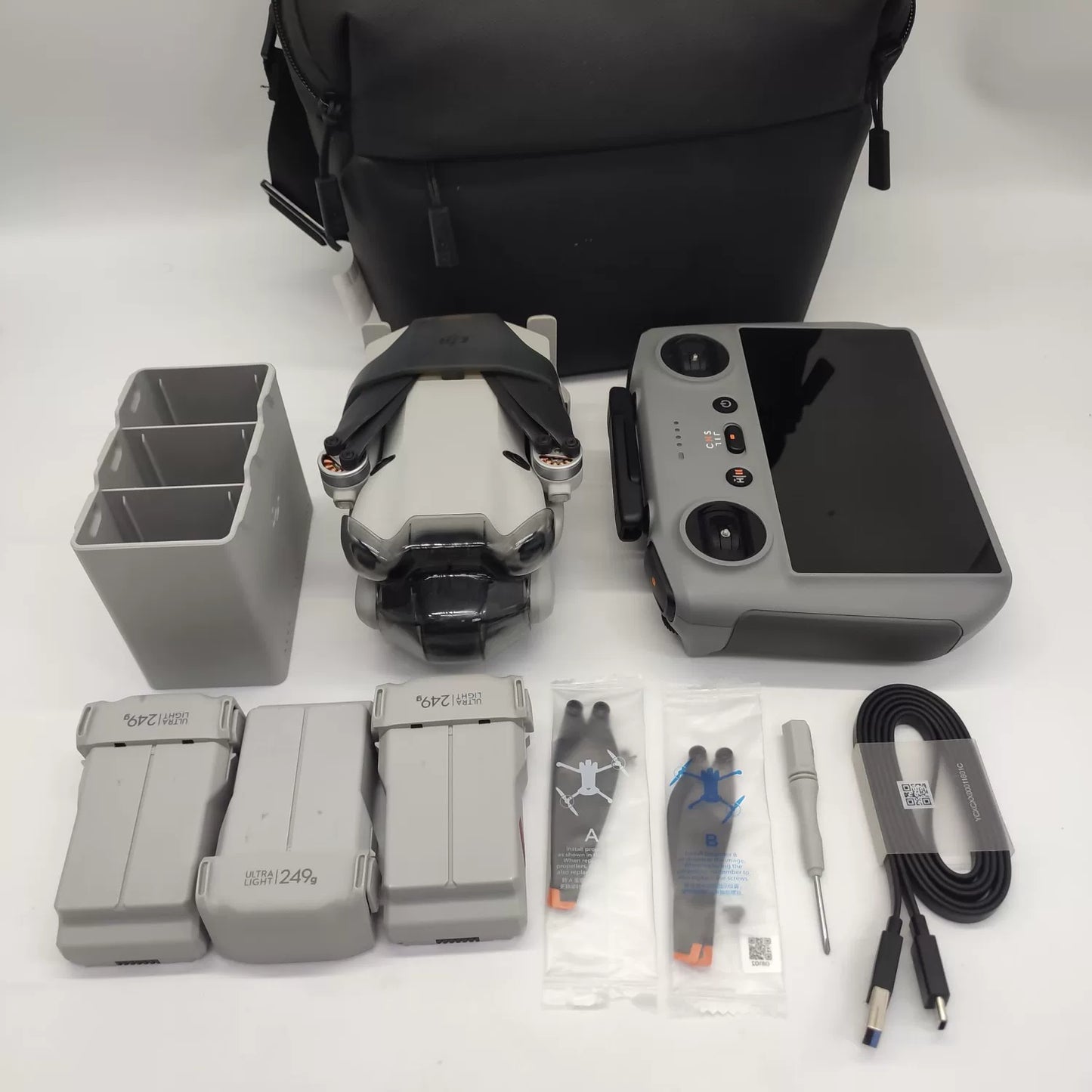 99% New (Mint) DJI Mini 4 Pro Fly More Combo