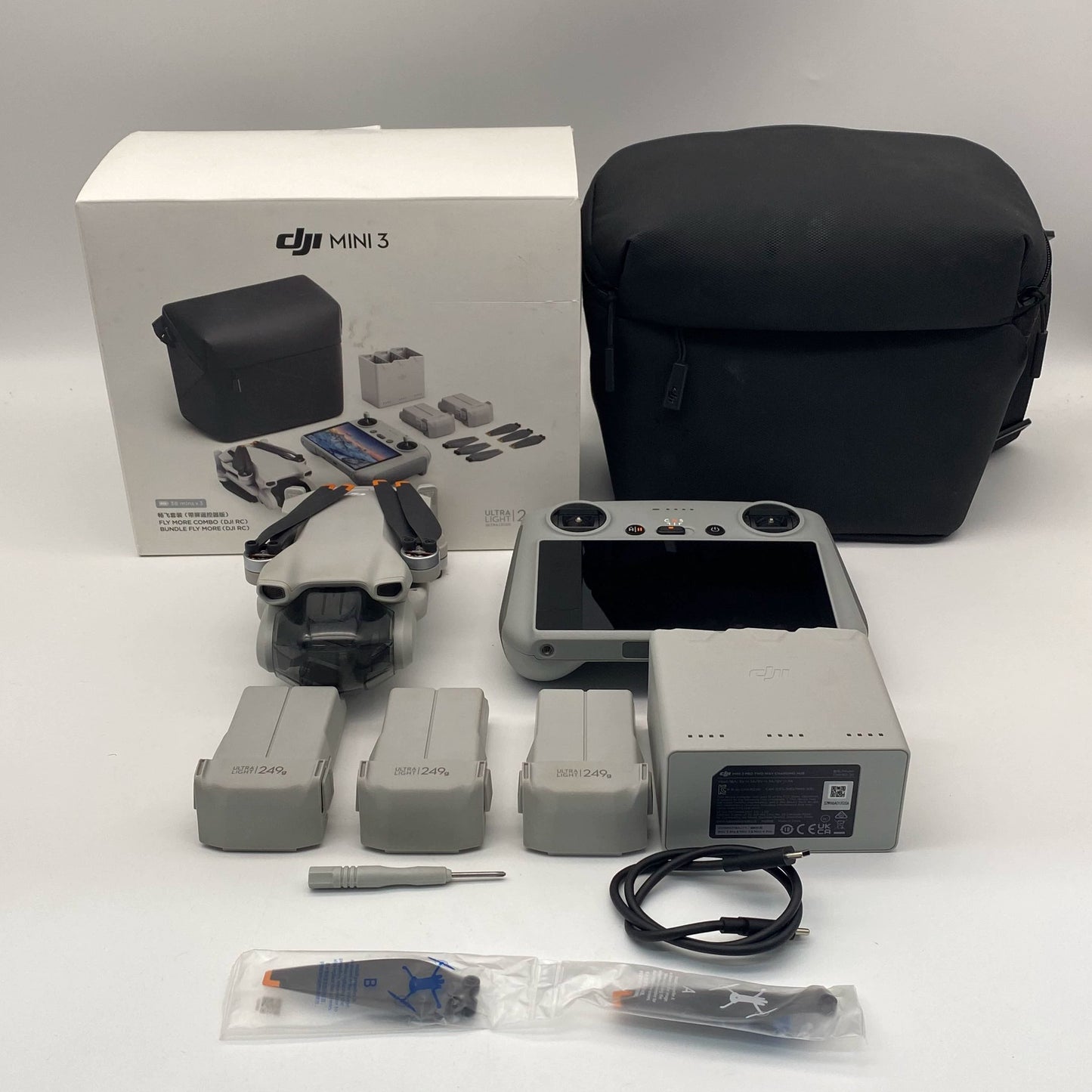 DJI Mini 3 with Screen Remote and Care Refresh - Excellent (95% New)