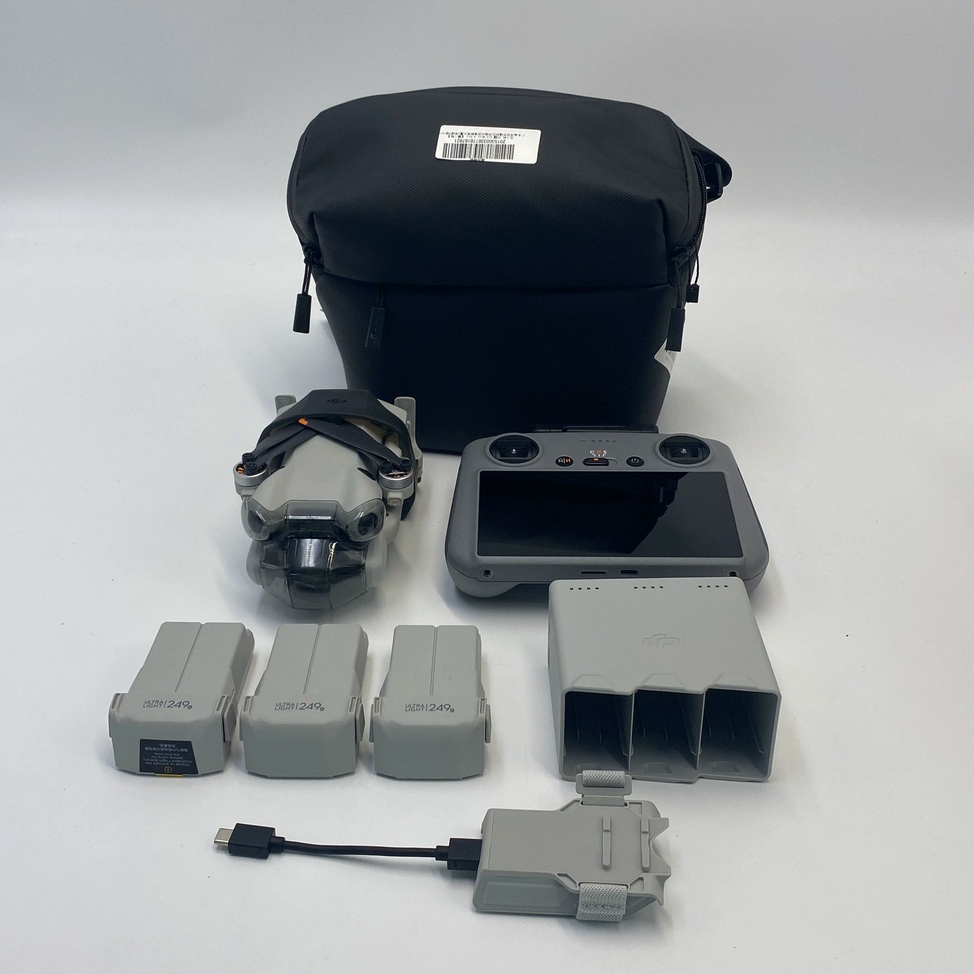 DJI Mini 4 Pro with Screen Remote Fly More Combo and Module - Excellent (95% New)