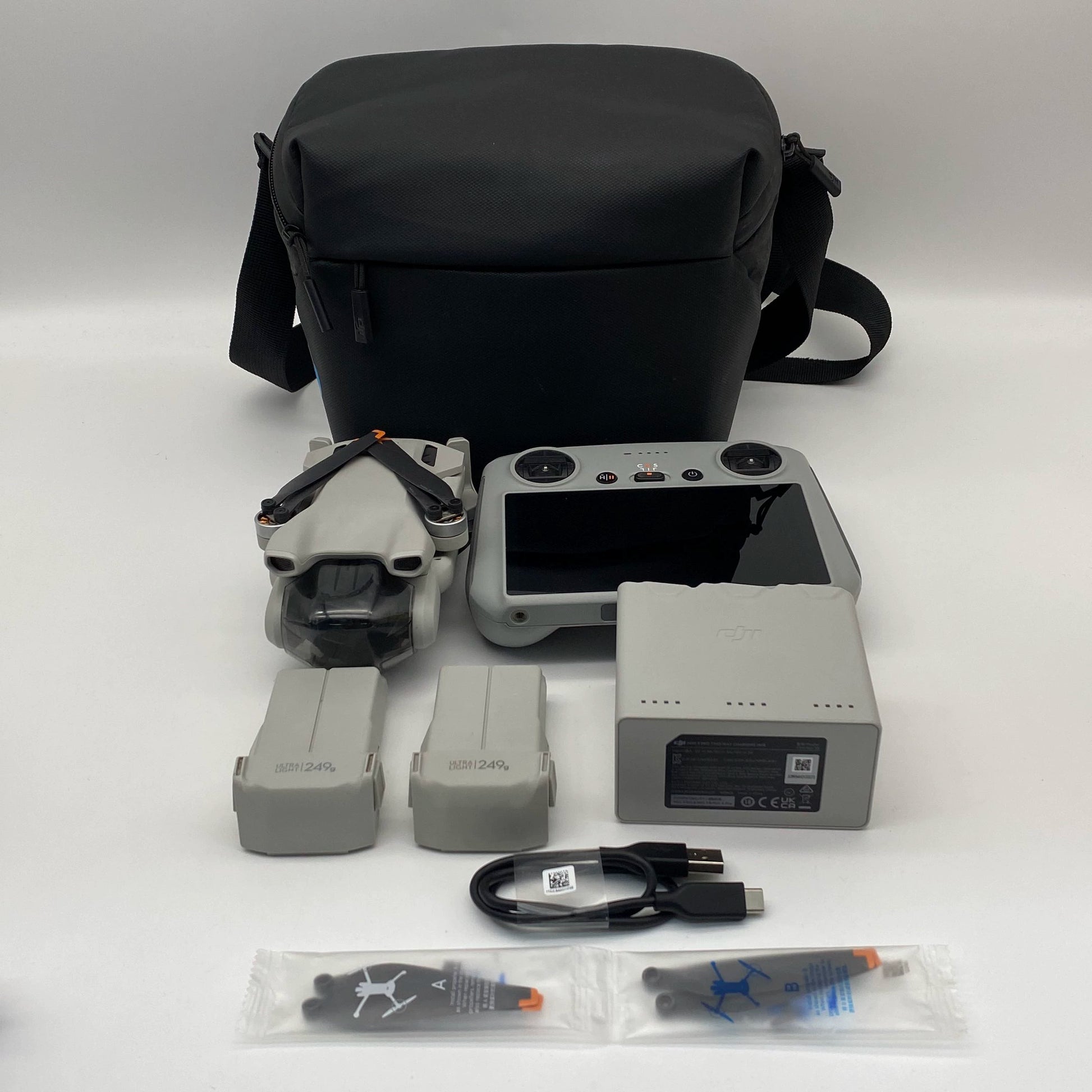 DJI Mini 3 with Screen Remote Controller - Excellent (95% New)