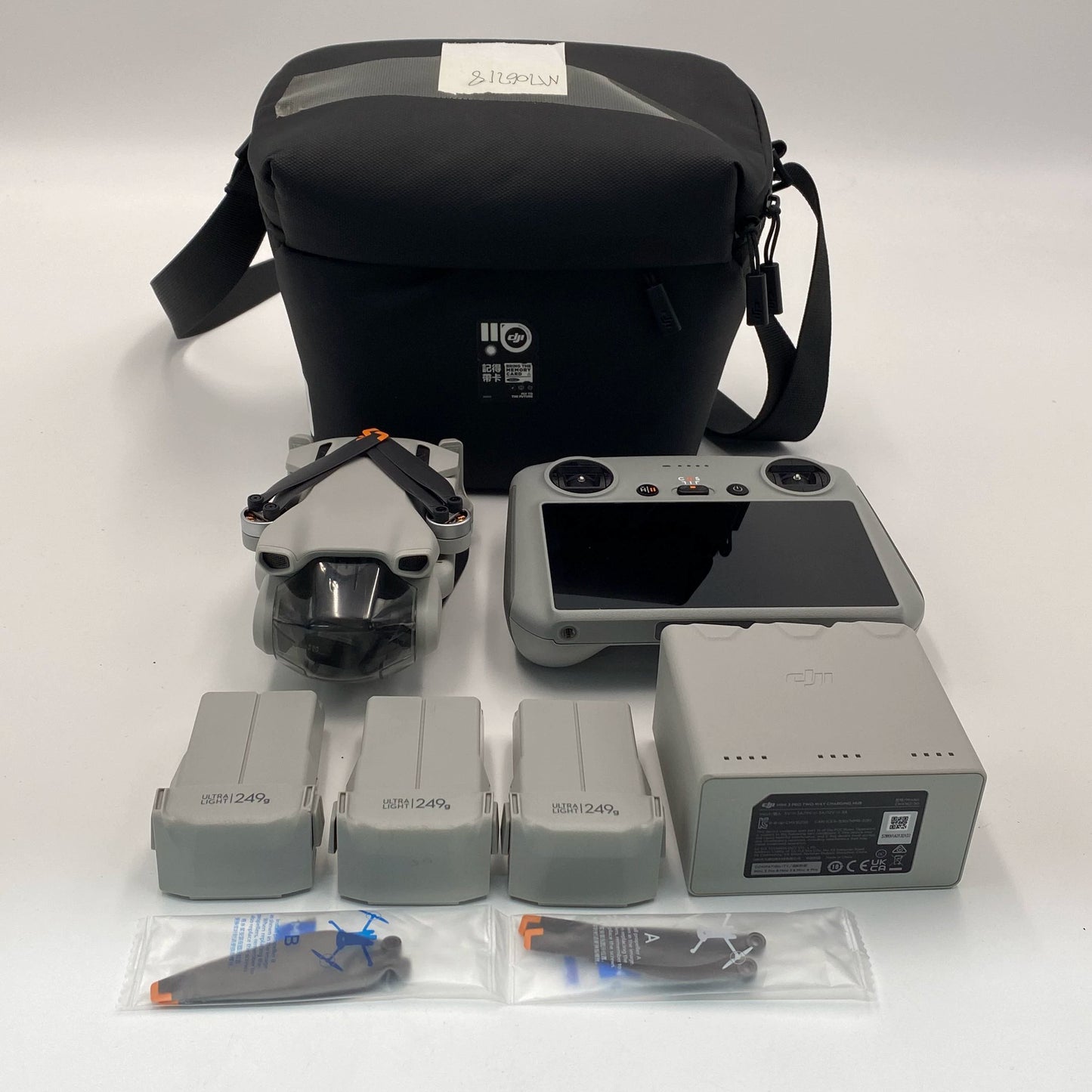 DJI Mini 3 with Screen Remote and Care Refresh - Excellent (95% New)