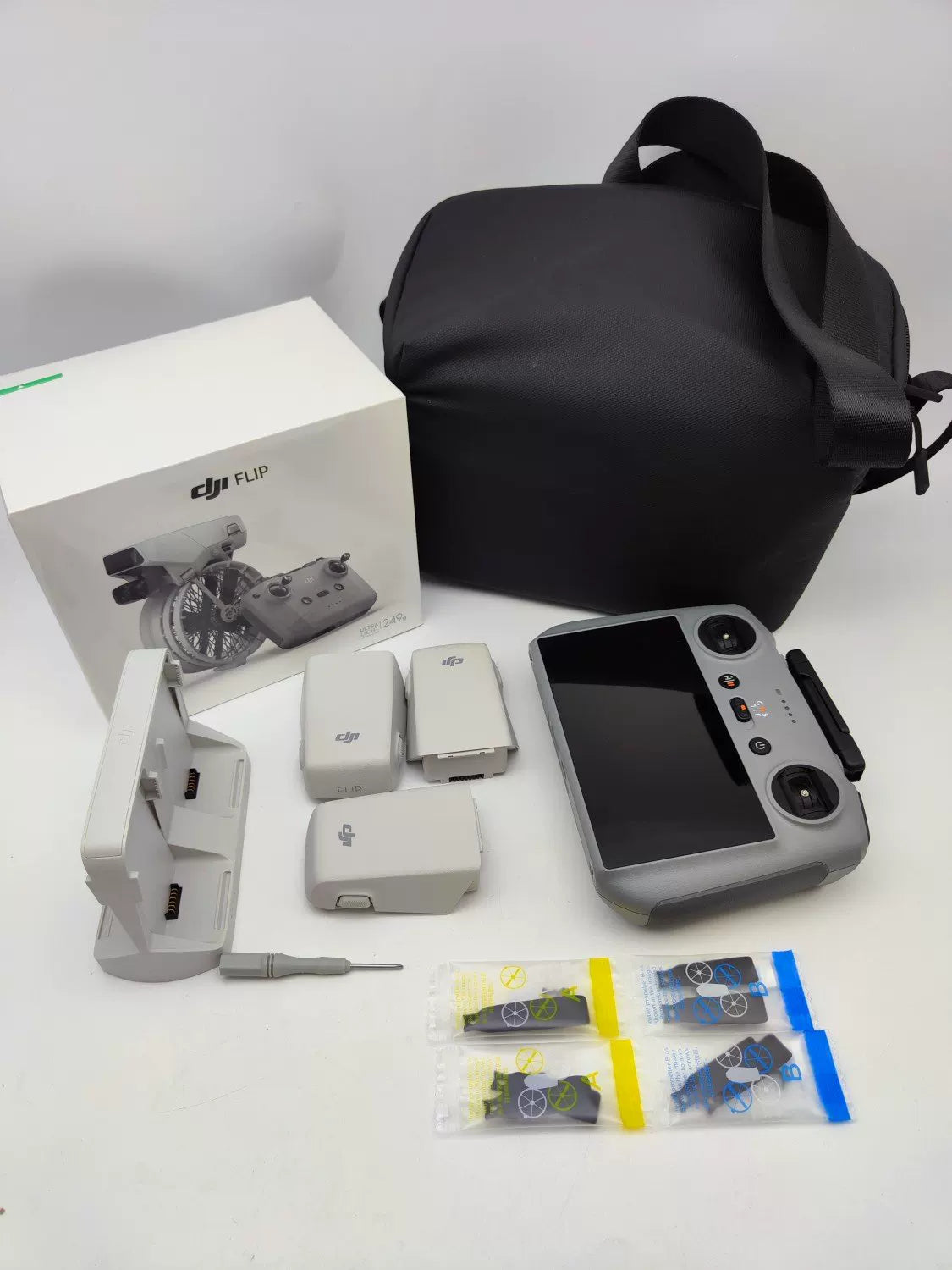 Brand New DJI flip with Screen Fly More Combo with DJI Care Refresh