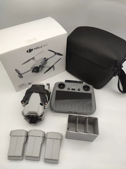99% New (Mint) DJI Mini 4 Pro with Screen, Extended Battery Fly More Combo with DJI Care Refresh