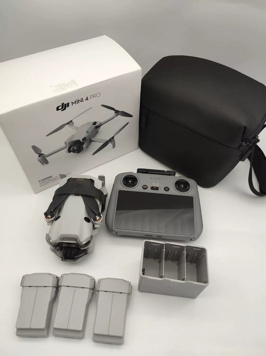 99% New (Mint) DJI Mini 4 Pro with Screen, Extended Battery Fly More Combo with DJI Care Refresh
