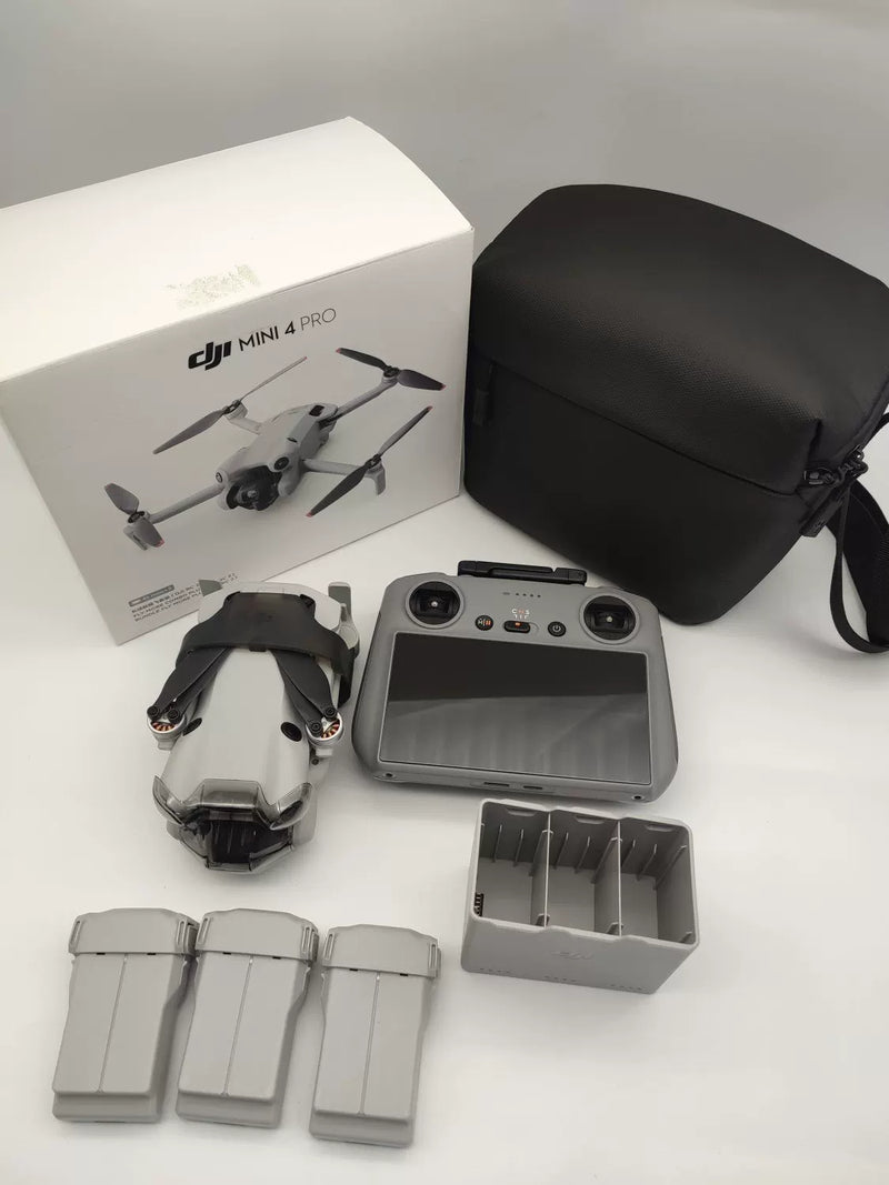 99% New (Mint) DJI Mini 4 Pro with Screen, Extended Battery Fly More Combo with DJI Care Refresh