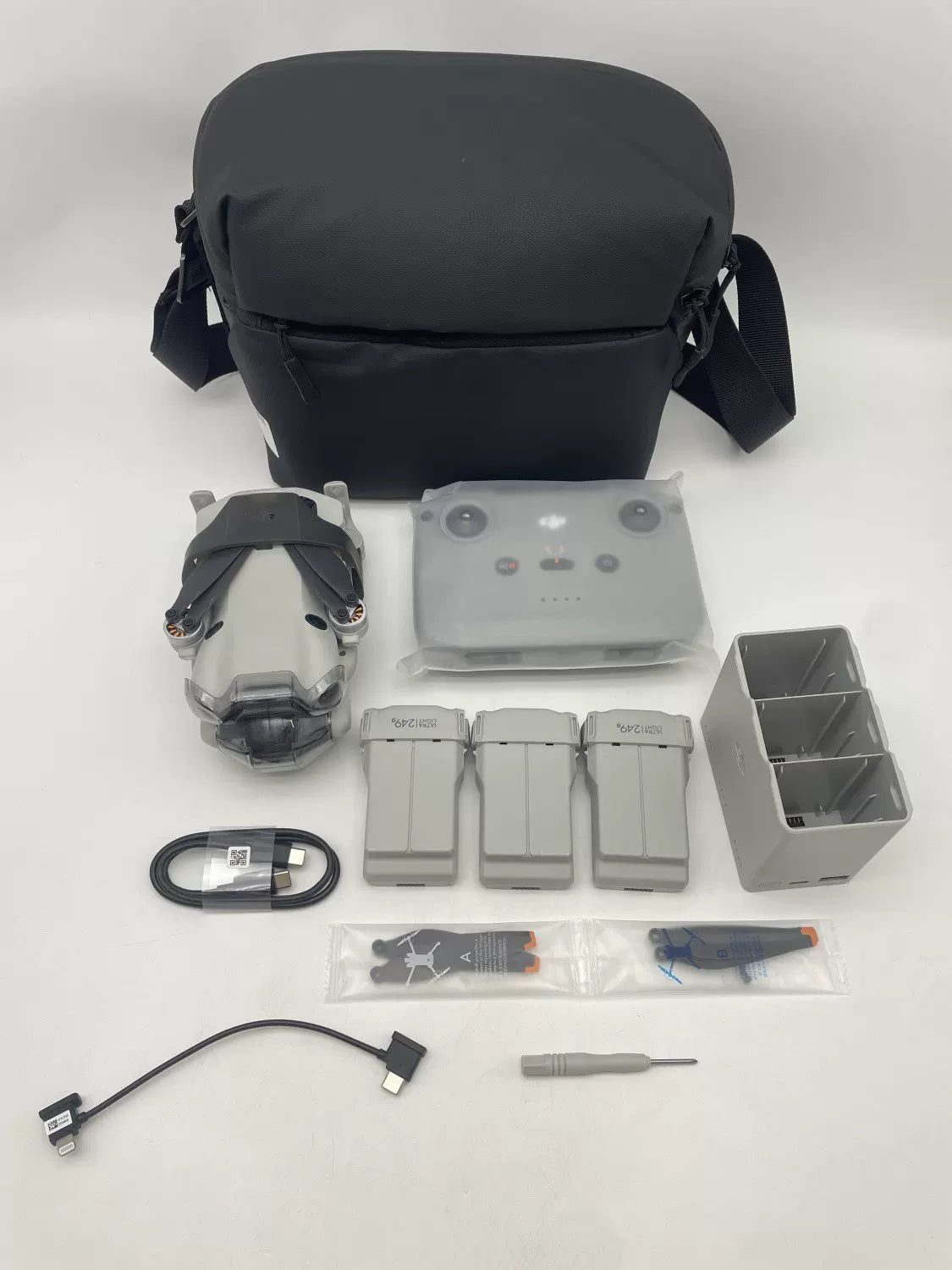 99% New (Mint) DJI Mini 4 Pro with Screen Fly More Combo with DJI Care Refresh