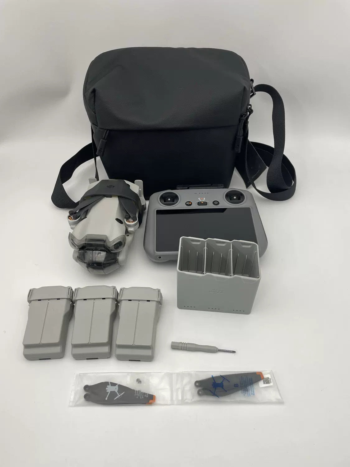 99% New (Mint) DJI Mini4pro with Screen, Extended Battery Fly More Combo with